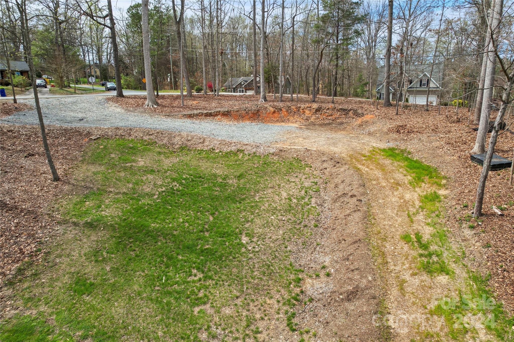 Lot 67 Lake Shore Road South Denver, NC 28037 - Photo 10 of 48 a backyard of a building with trees