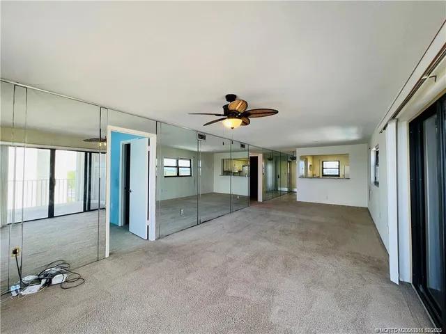 a view of a kitchen with a sink cabinets and a window