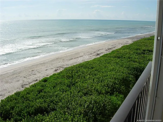 a view of beach and ocean