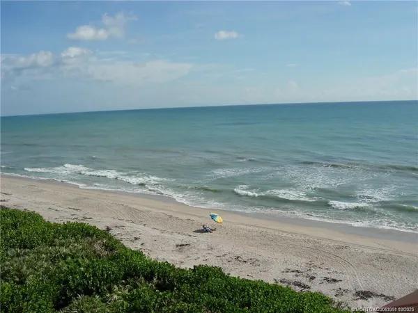 a view of beach and ocean