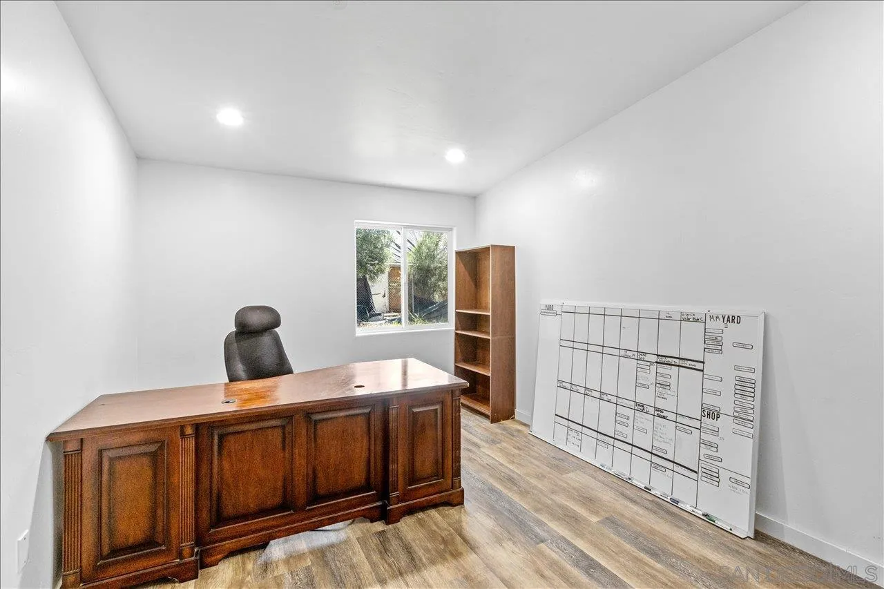 5461 Rainbow Creek Road, Unit THREE LEGAL LOTS Fallbrook, CA 92028 - Photo 20 of 28 a bedroom with furniture and a window