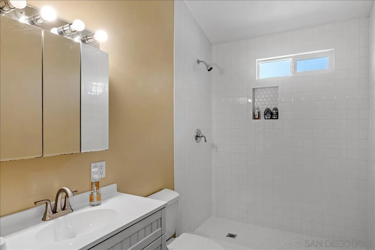 5461 Rainbow Creek Road, Unit THREE LEGAL LOTS Fallbrook, CA 92028 - Photo 27 of 28 a bathroom with a sink a toilet and shower