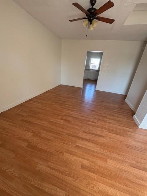709 Grape Street, Unit D Abilene, TX 79601 - Photo 2 of 7 a view of a big room with wooden floor and windows