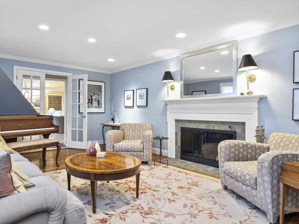 177 Hampshire Road Wellesley, MA 02481 - Photo 10 of 15 a living room with furniture and a fireplace
