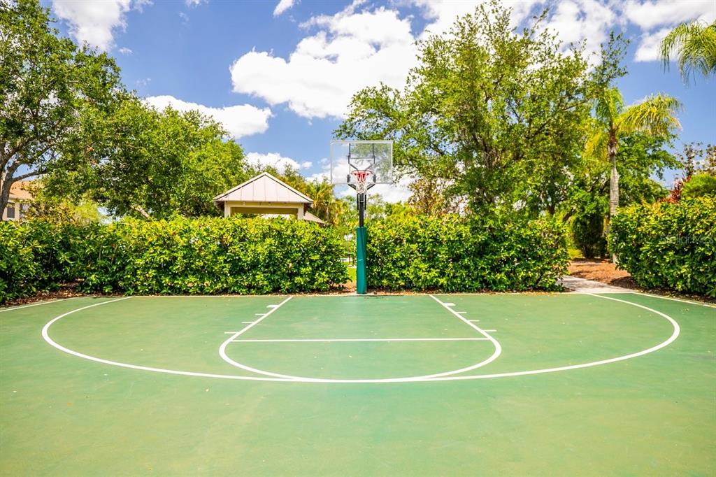 11790 Fennemore Way Parrish, FL 34219 - Photo 24 of 41 a view of a tennis court