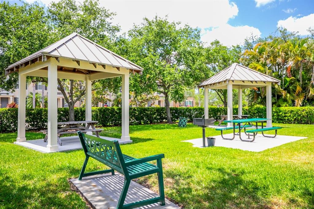 11790 Fennemore Way Parrish, FL 34219 - Photo 26 of 41 a view of a chair and table in the garden