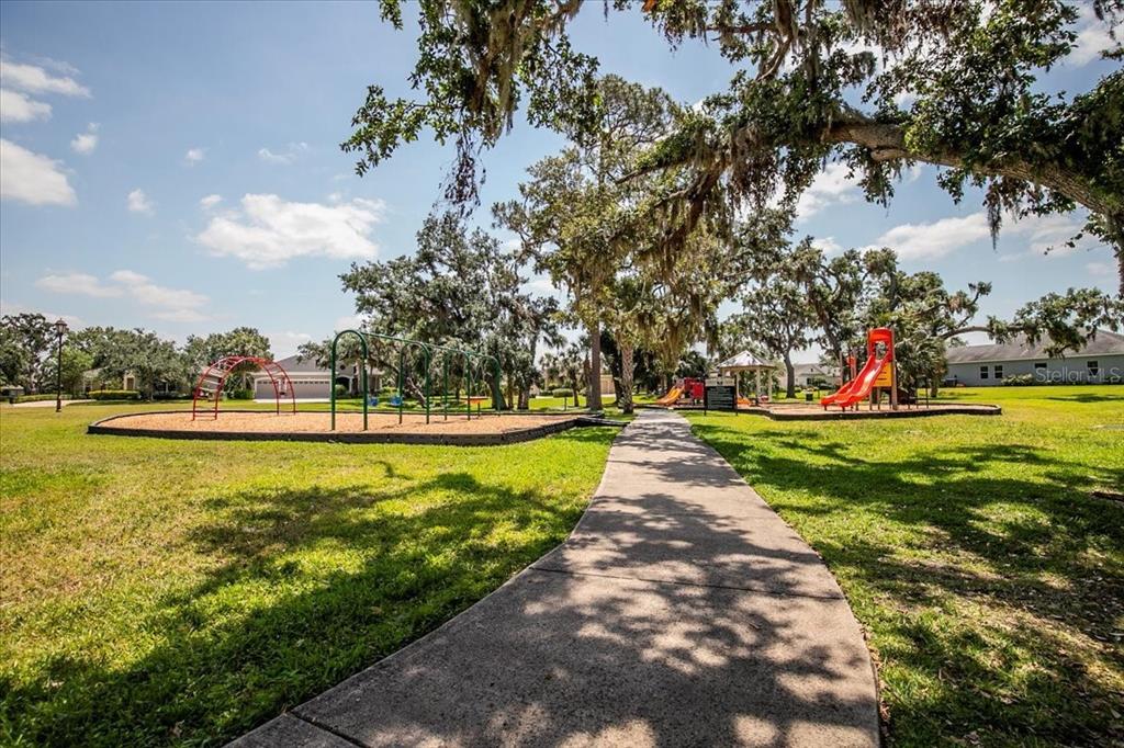 11790 Fennemore Way Parrish, FL 34219 - Photo 27 of 41 a view of a lake with houses