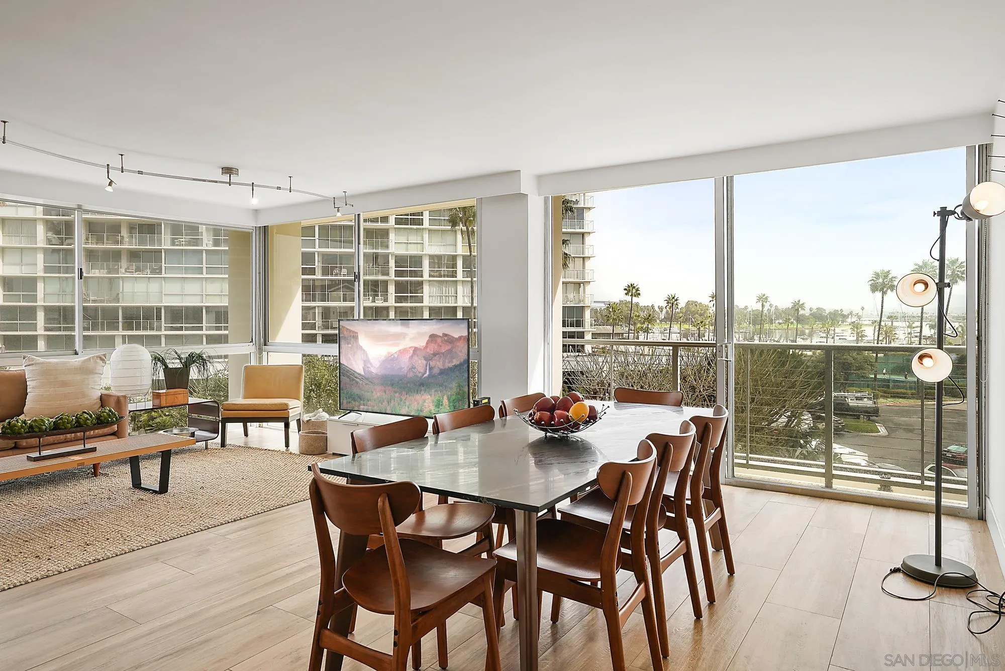 1720 Avenida Del Mundo, Unit 208 Coronado, CA 92118 - Photo 13 of 42 a view of a dining room with furniture window and outside view