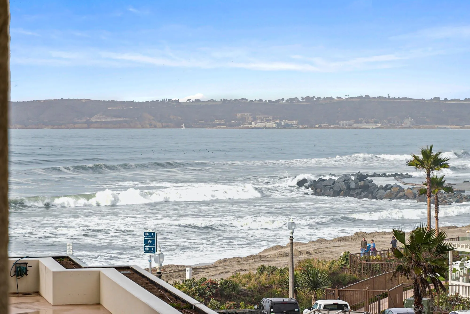 1720 Avenida Del Mundo, Unit 208 Coronado, CA 92118 - Photo 35 of 42 a view of a lake with a mountain