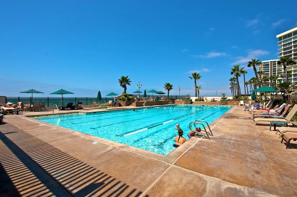 1720 Avenida Del Mundo, Unit 208 Coronado, CA 92118 - Photo 41 of 42 a view of a park with many windows