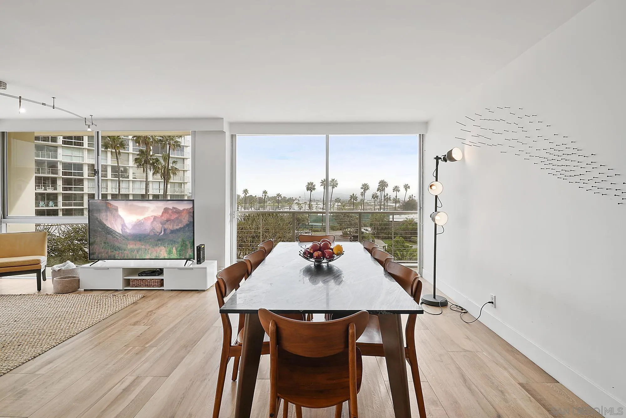 1720 Avenida Del Mundo, Unit 208 Coronado, CA 92118 - Photo 7 of 42 a view of a dining room with furniture window and outside view