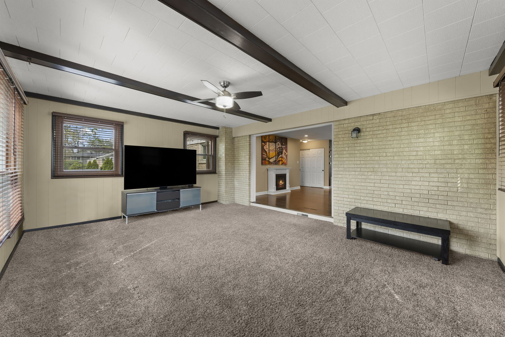 5818 Ridgewood Drive Western Springs, IL 60558 - Photo 11 of 25 a living room with furniture and a flat screen tv
