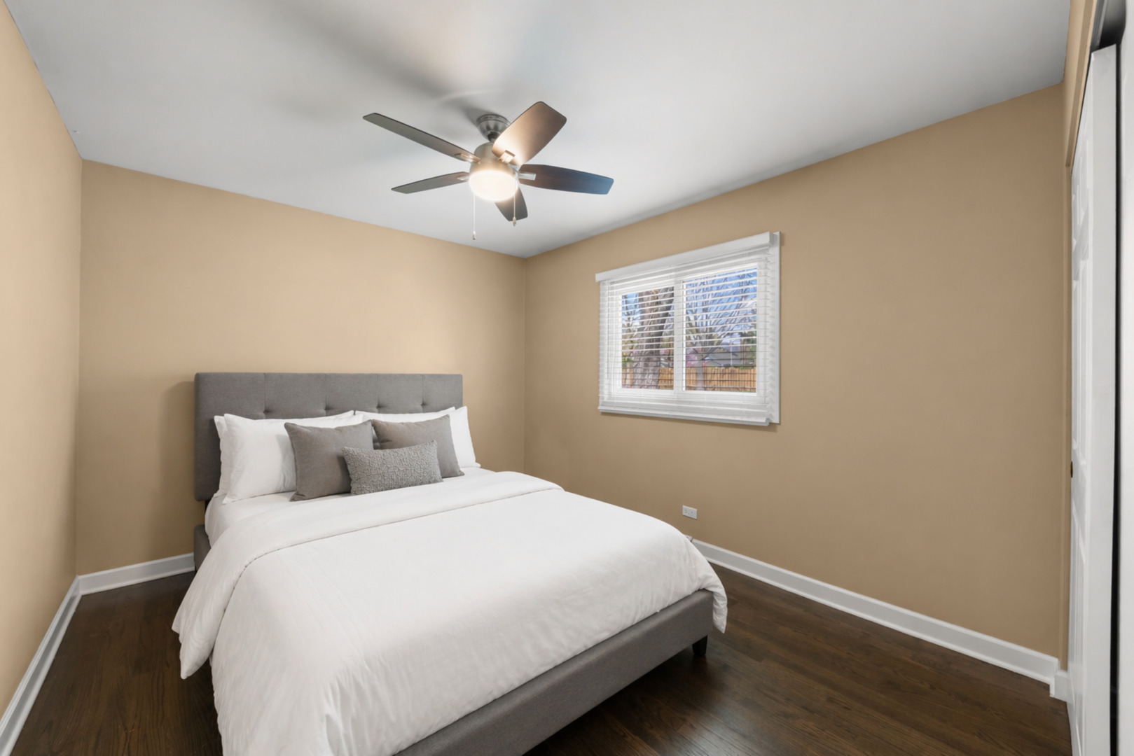 5818 Ridgewood Drive Western Springs, IL 60558 - Photo 14 of 25 a bedroom with a large bed and a window
