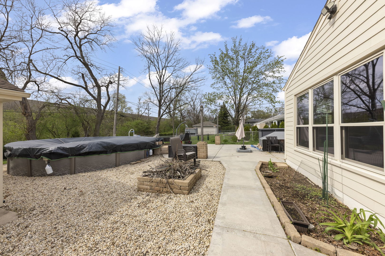 5818 Ridgewood Drive Western Springs, IL 60558 - Photo 21 of 25 a view of a yard with chairs and tree
