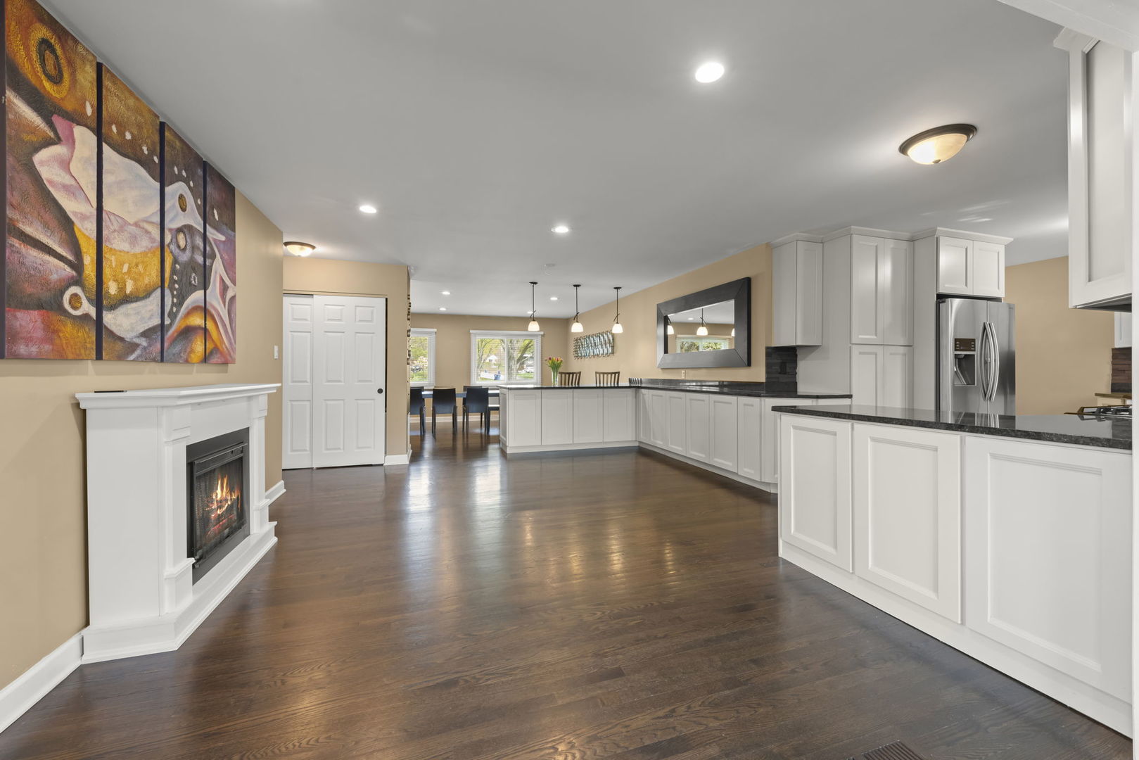 5818 Ridgewood Drive Western Springs, IL 60558 - Photo 6 of 25 a kitchen with stainless steel appliances granite countertop a stove top oven a sink and a refrigerator