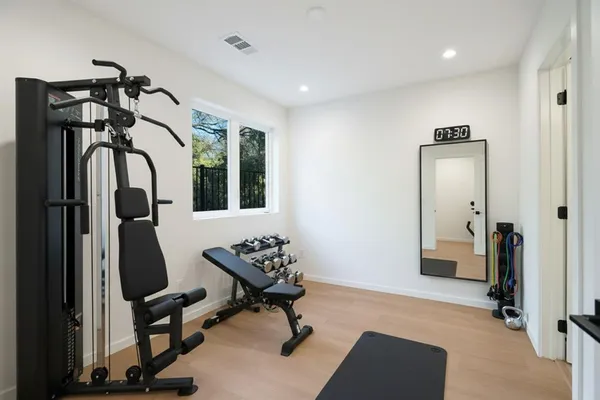 a view of a room with gym equipment