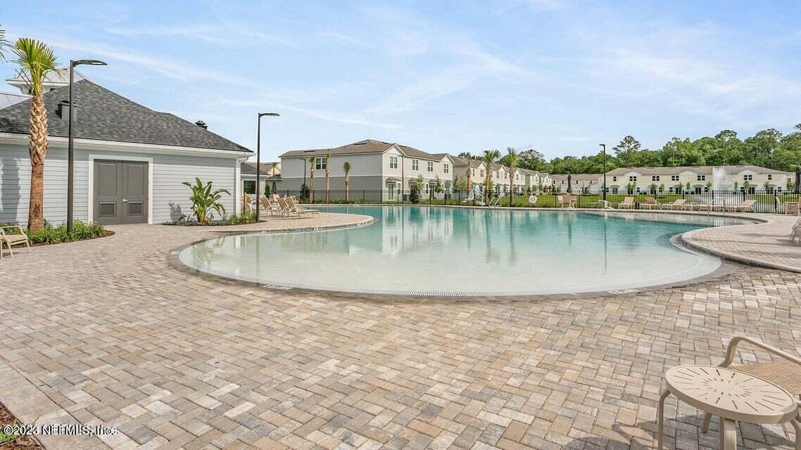 409 Talulla Trail St. Augustine, FL 32095 - Photo 15 of 58 a view of a lake with a house
