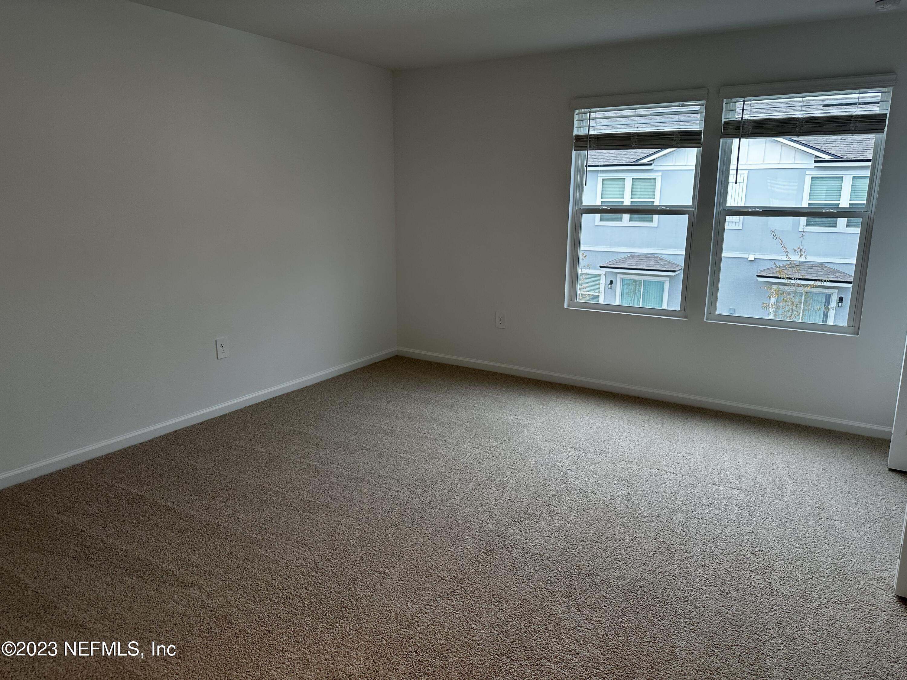 409 Talulla Trail St. Augustine, FL 32095 - Photo 38 of 58 an empty room with a window