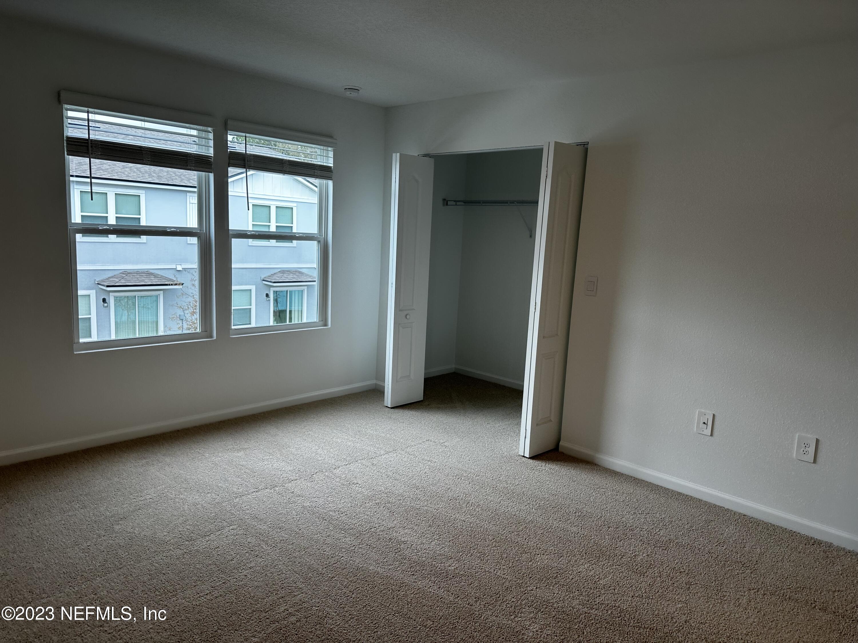 409 Talulla Trail St. Augustine, FL 32095 - Photo 42 of 58 an empty room with a window
