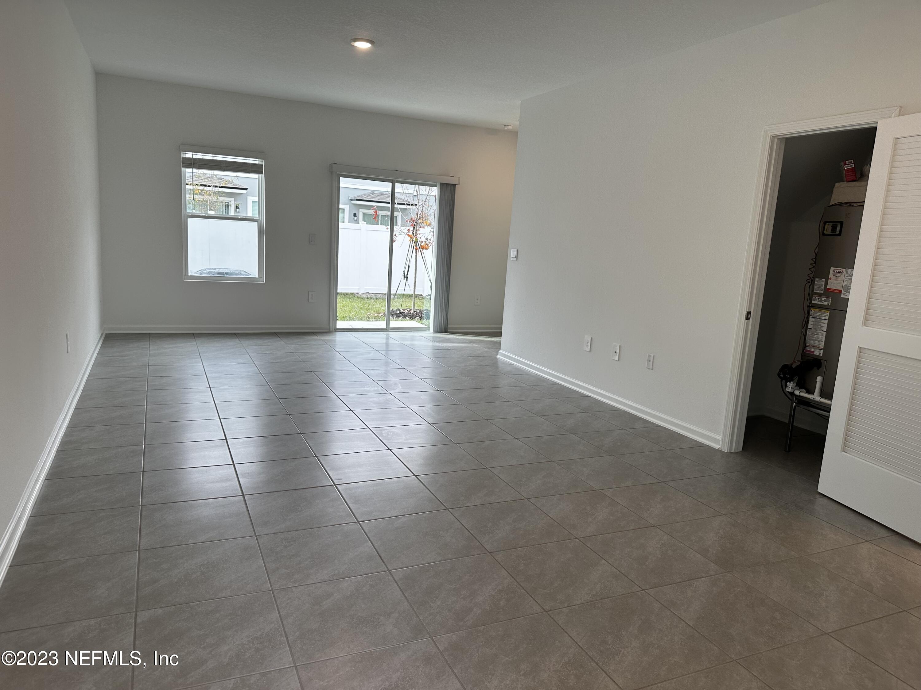 409 Talulla Trail St. Augustine, FL 32095 - Photo 8 of 58 a view of an empty room with a window