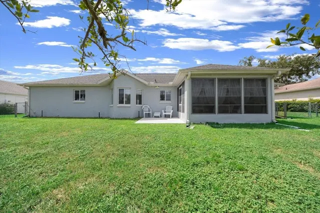 a front view of a house with a garden and porch
