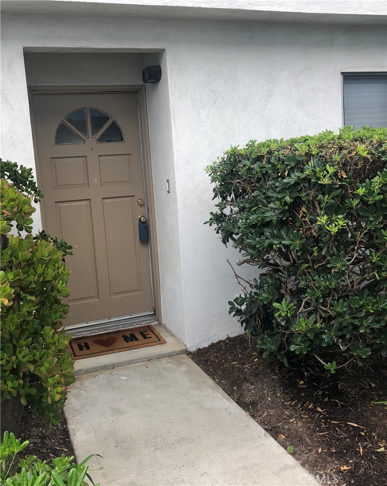 264 Cabrillo Street Costa Mesa, CA 92627 - Photo 4 of 17 a view of front door and yard