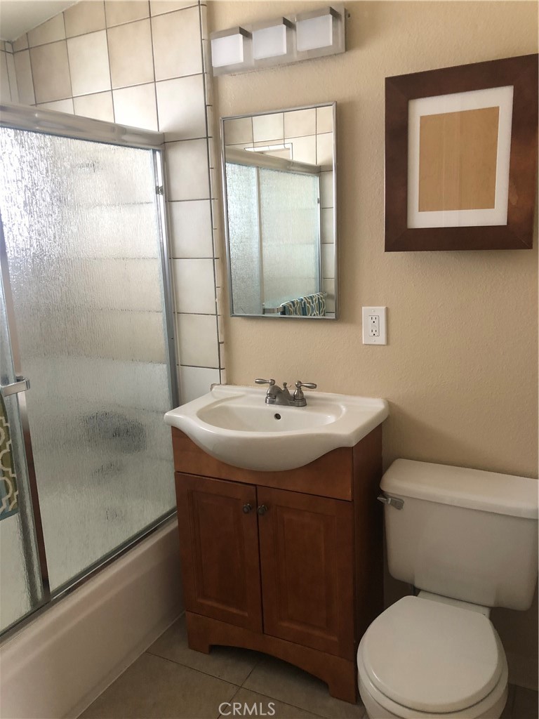 264 Cabrillo Street Costa Mesa, CA 92627 - Photo 8 of 17 a bathroom with a sink toilet and shower
