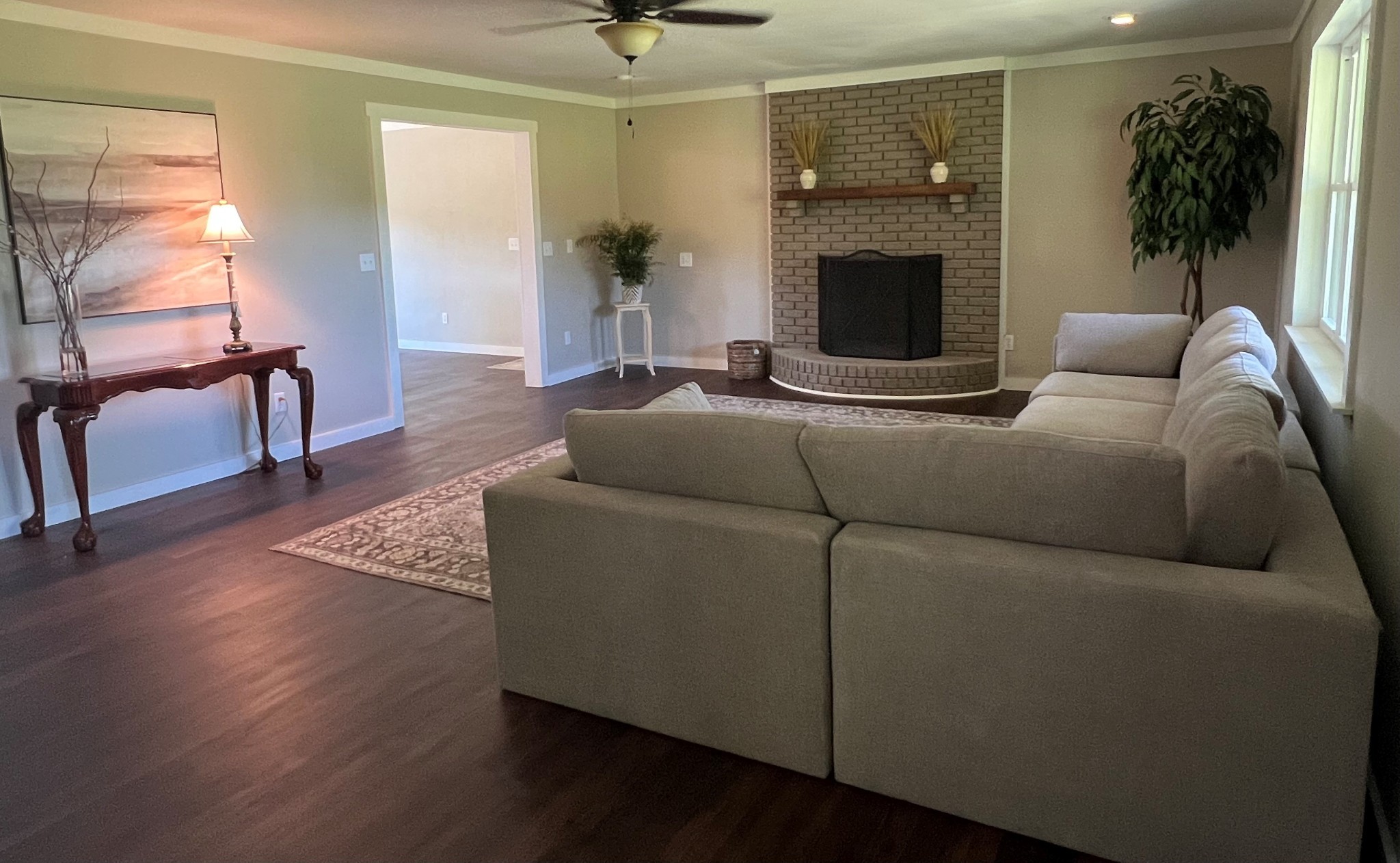 1280 Brandontown Road Manchester, TN 37355 - Photo 13 of 56 Family room is large with fireplace, new hardwood, new ceiling fan