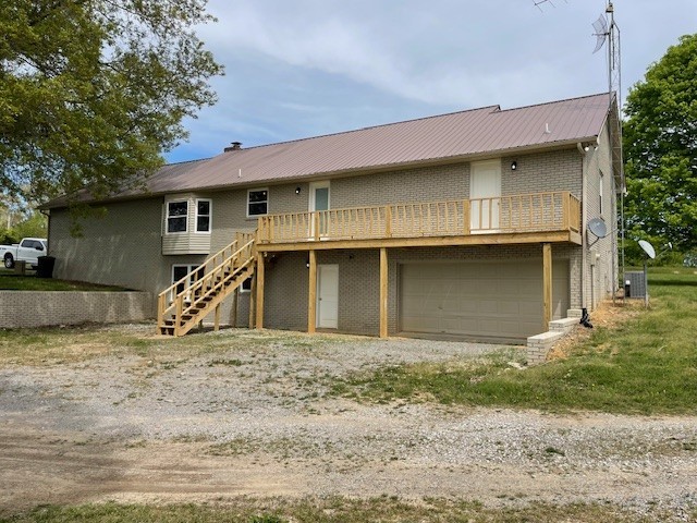 1280 Brandontown Road Manchester, TN 37355 - Photo 48 of 56 Back view. Basement area is updated with full bath, large den, bedroom, kitchenette, and private entrance.