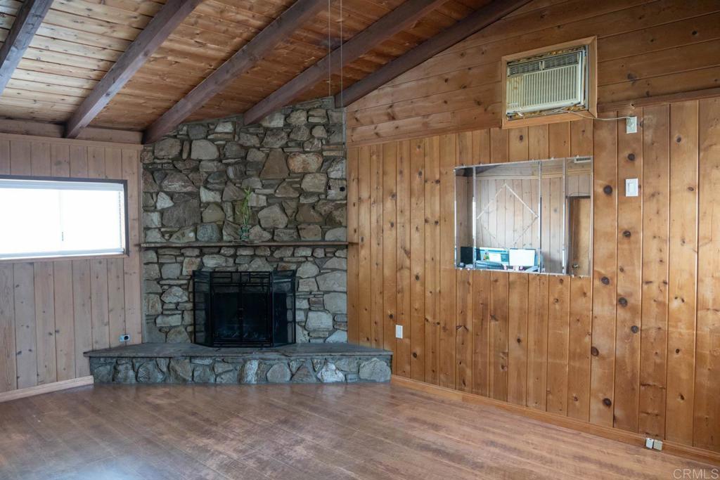 15523 Studebaker Road Norwalk, CA 90650 - Photo 12 of 59 a living room with a fireplace