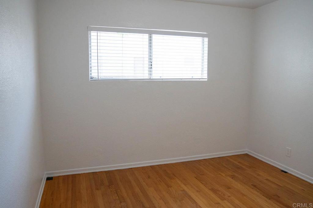 15523 Studebaker Road Norwalk, CA 90650 - Photo 19 of 59 an empty room with a window
