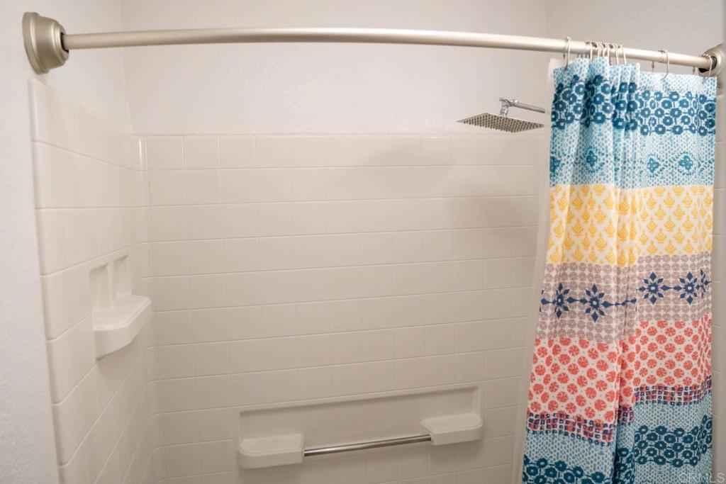 15523 Studebaker Road Norwalk, CA 90650 - Photo 22 of 59 a bathroom with a shower