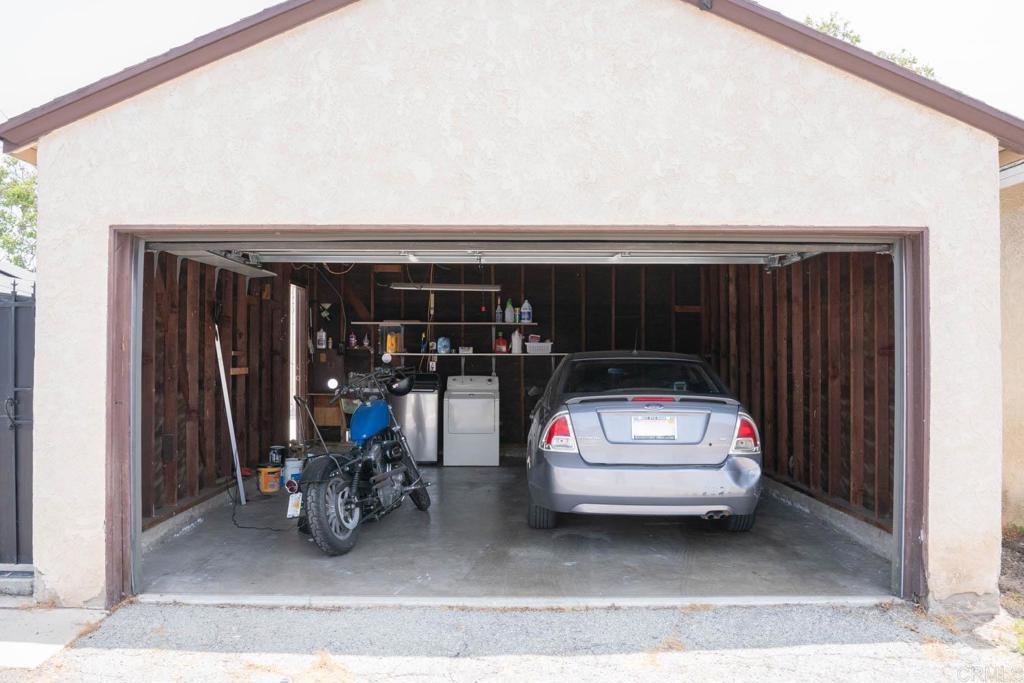 15523 Studebaker Road Norwalk, CA 90650 - Photo 25 of 59 a car parked in front of house