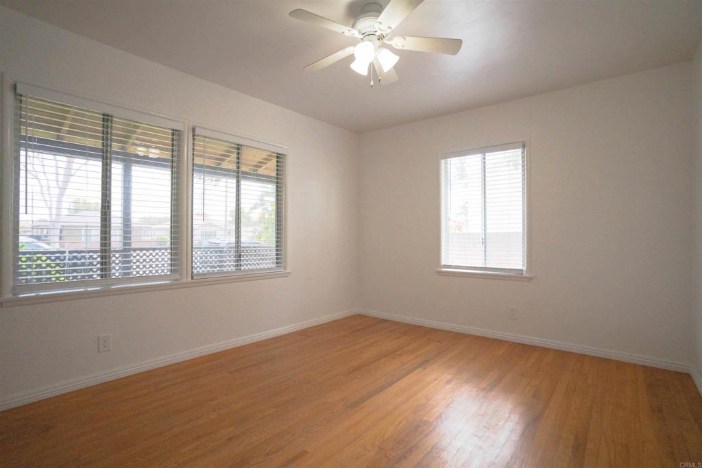 15523 Studebaker Road Norwalk, CA 90650 - Photo 3 of 59 a view of wooden floor and windows in a room