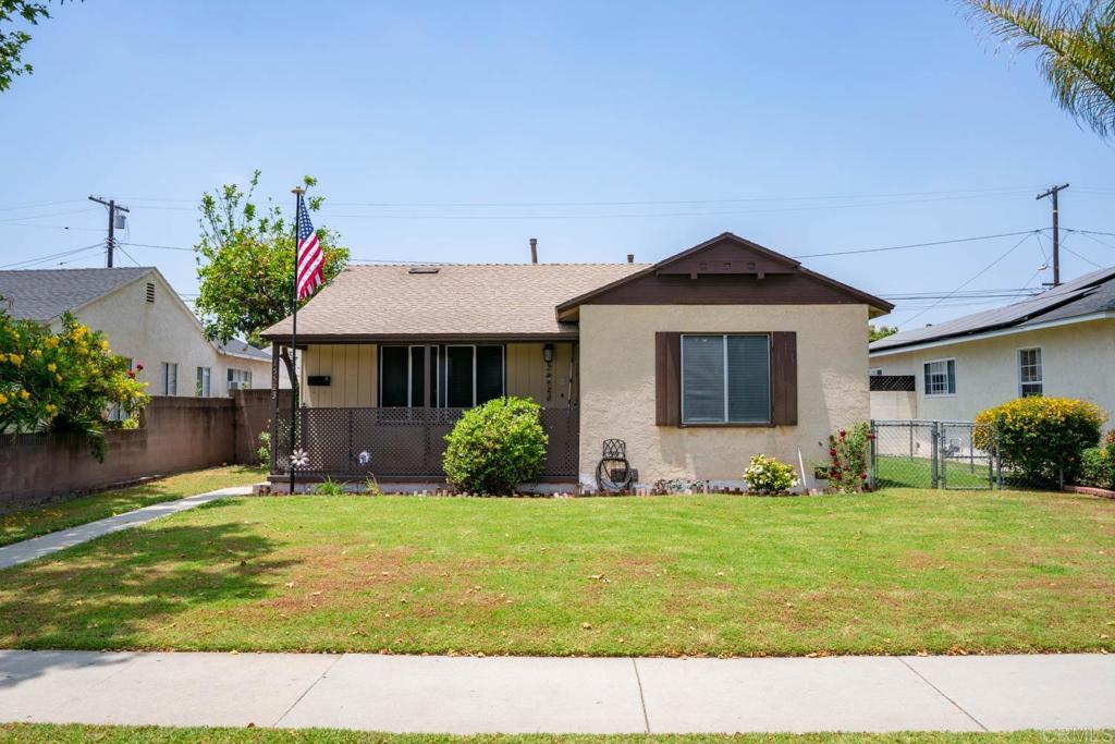 15523 Studebaker Road Norwalk, CA 90650 - Photo 50 of 59 a front view of a house with garden