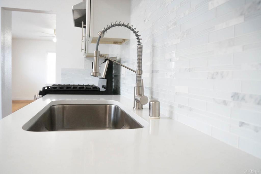 15523 Studebaker Road Norwalk, CA 90650 - Photo 5 of 59 a close view of sink and tap