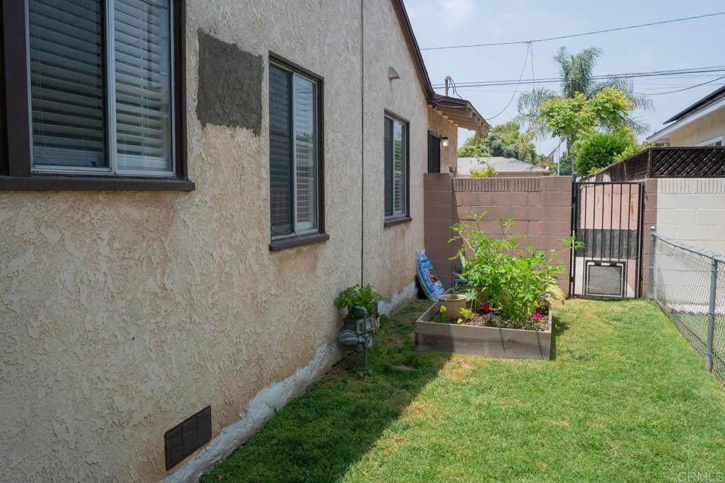 15523 Studebaker Road Norwalk, CA 90650 - Photo 8 of 59 a view of a backyard with potted plants