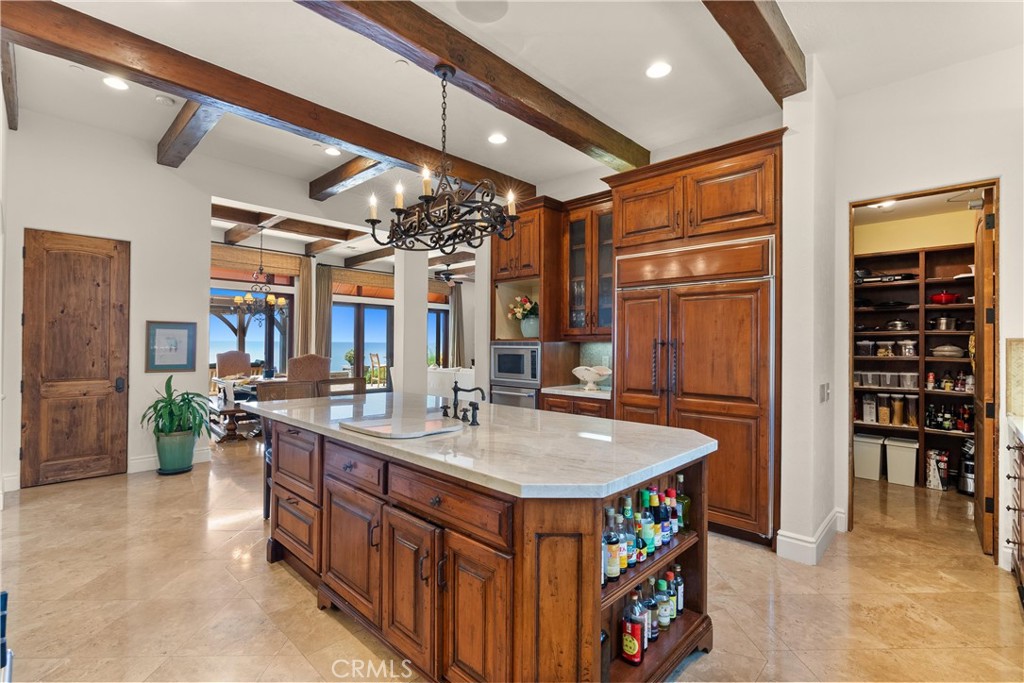 4 Le Conte Laguna Niguel, CA 92677 - Photo 12 of 65 a utility room with stainless steel appliances granite countertop a sink and a refrigerator