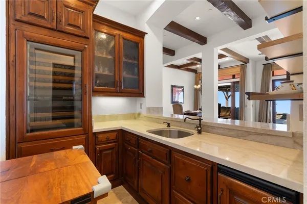 a spacious bathroom with a double vanity sink a mirror and a shower