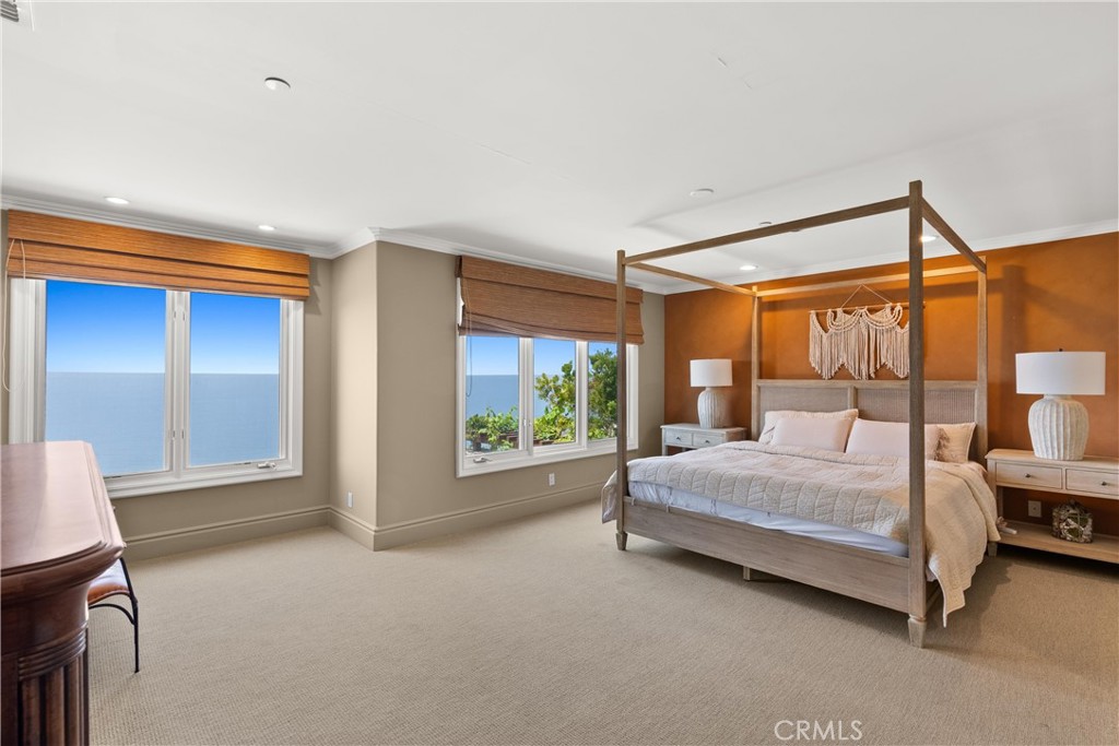 4 Le Conte Laguna Niguel, CA 92677 - Photo 41 of 65 a bedroom with a bed and large window