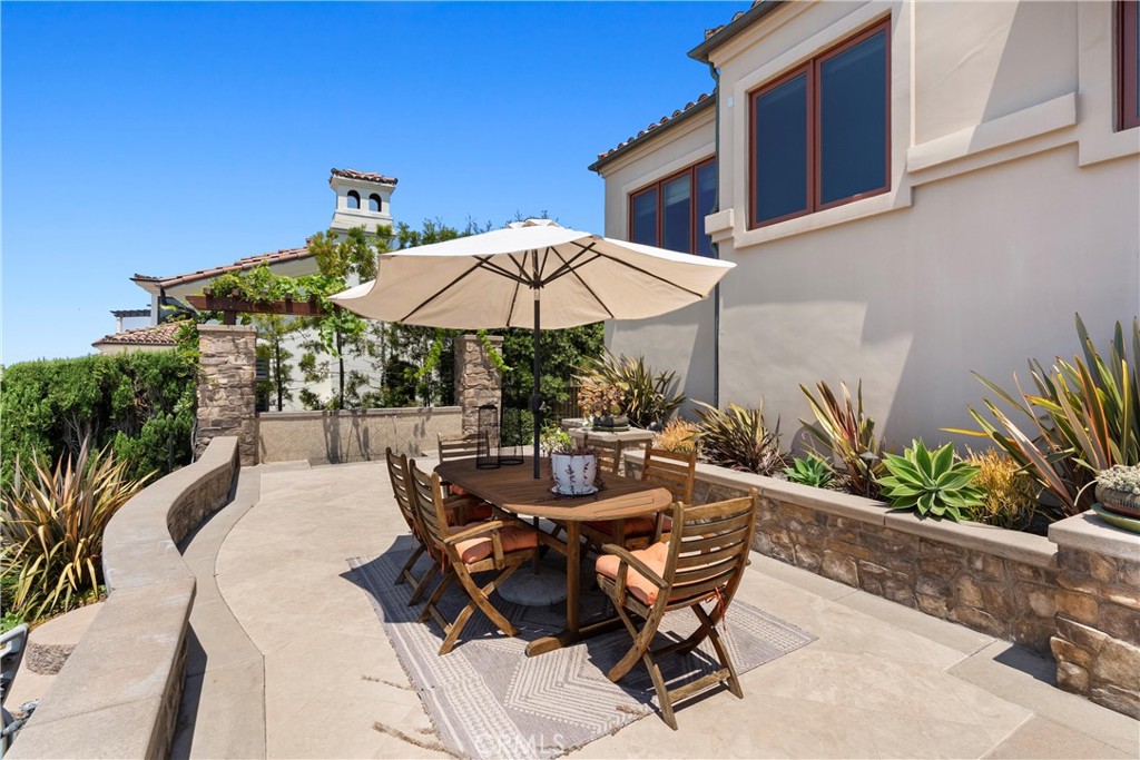 4 Le Conte Laguna Niguel, CA 92677 - Photo 54 of 65 a view of a patio with furniture and a small yard