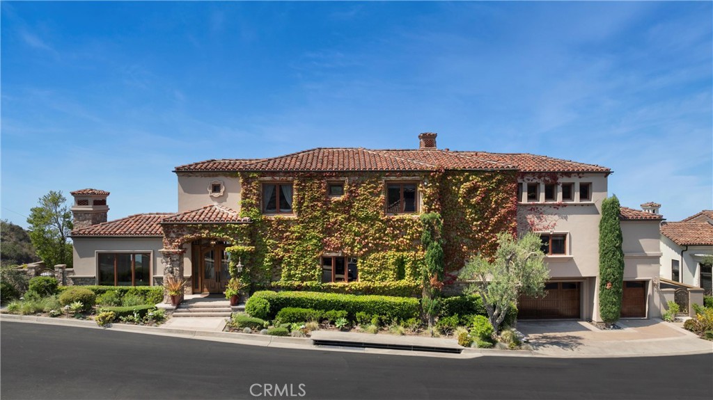 4 Le Conte Laguna Niguel, CA 92677 - Photo 59 of 65 a front view of a house with a garden
