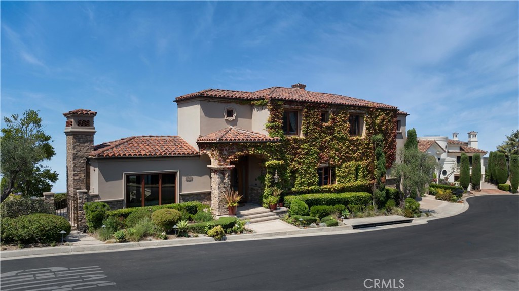 4 Le Conte Laguna Niguel, CA 92677 - Photo 60 of 65 a front view of a house with a garden