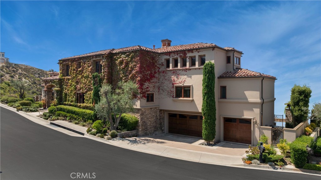 4 Le Conte Laguna Niguel, CA 92677 - Photo 61 of 65 a front view of a house with a garden