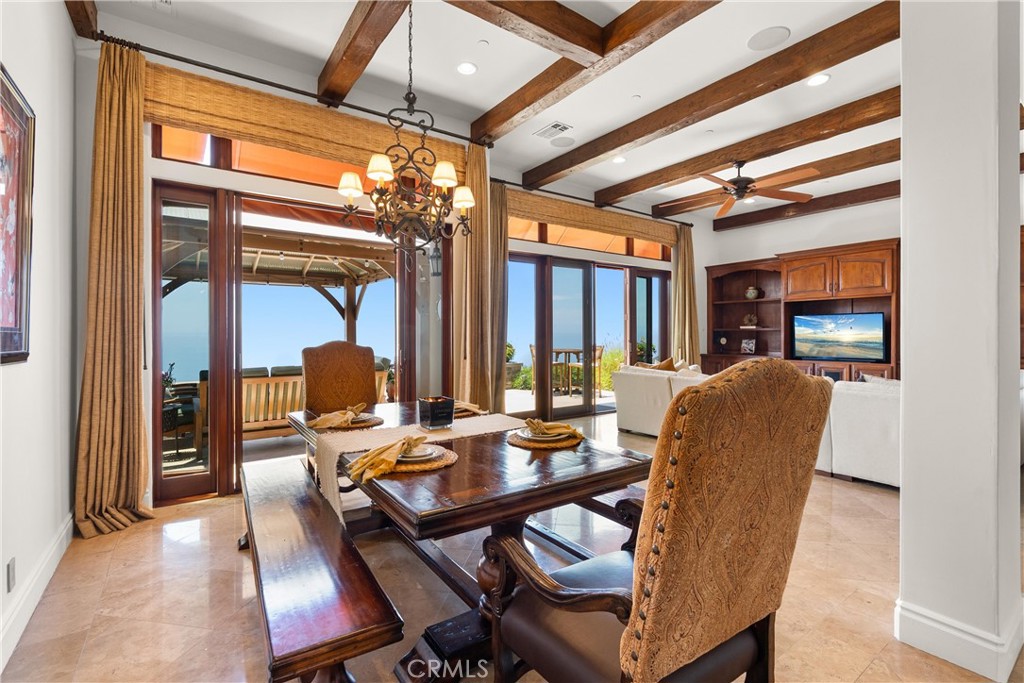 4 Le Conte Laguna Niguel, CA 92677 - Photo 7 of 65 a dining room with furniture a chandelier and wooden floor