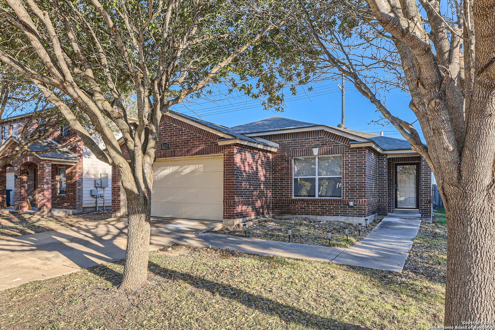 209 Jersey Cibolo, TX 78108 - Photo 1 of 1 a front view of a house with garden