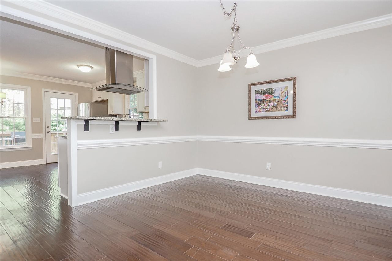 7401 Rolling Dale Court Raleigh, NC 27615 - Photo 4 of 25 The dining room is open to the kitchen and is big enough for large holiday gatherings. Dining Room