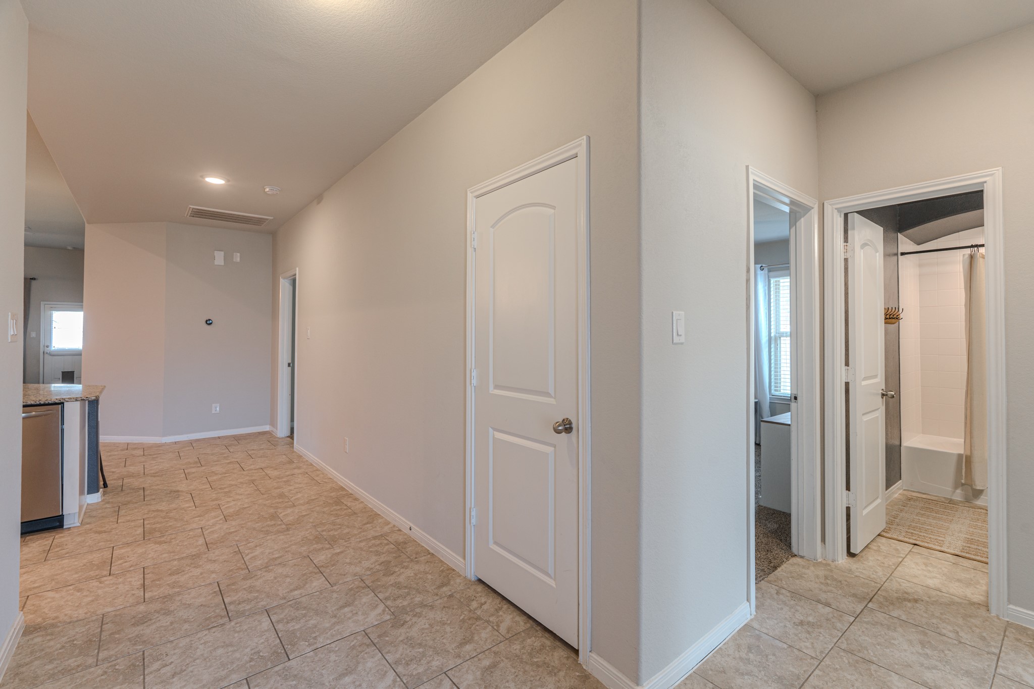 14207 Irvine Rnch Trail Conroe, TX 77384 - Photo 3 of 29 a view of entryway with bathroom