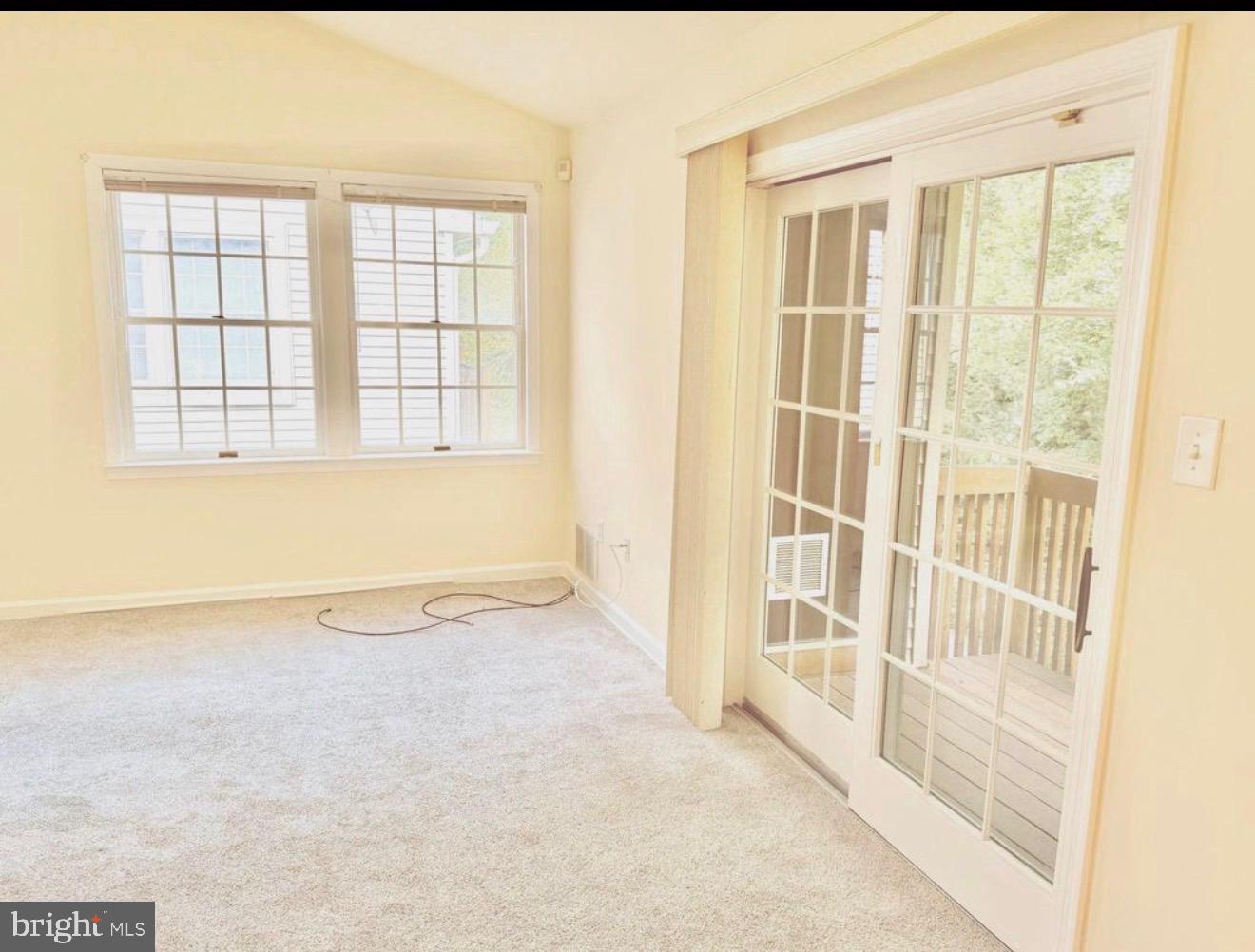 47 Eraser Road, Unit 47 Moorestown, NJ 08057 - Photo 3 of 4 an empty room with a fireplace