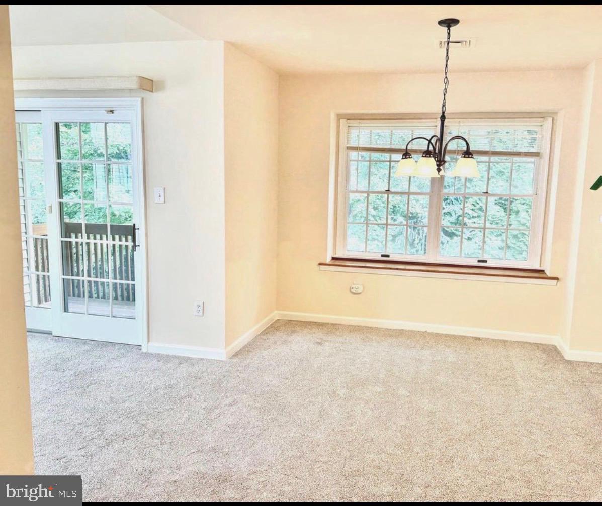 47 Eraser Road, Unit 47 Moorestown, NJ 08057 - Photo 4 of 4 a view of an empty room with a window